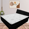 The image features a luxury mattress in a room with various interior design elements such as a window, wall, pillow, bedding, cushion, furniture, vase, nightstand, throw pillow, and duvet. The room appears to be a well-designed bedroom in a hotel suite.