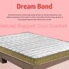 An image of a mattress adorned with the text "dream bond," representing a promise of comfort and a good night's sleep.